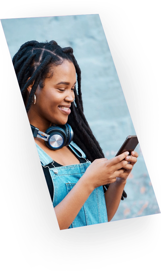 student holding iphone